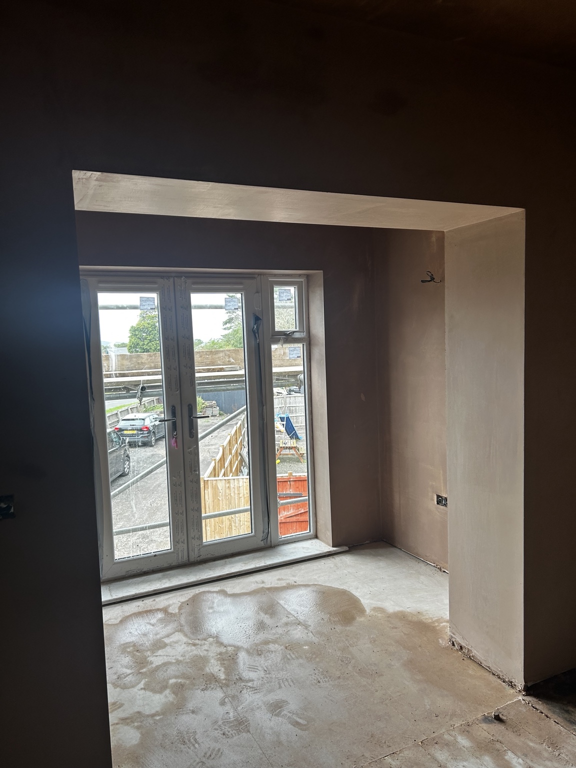 Plastered room with garden doors
